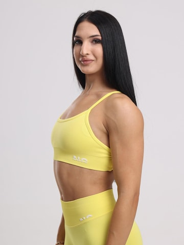 neverover Korzetová Sportovní podprsenka 'Hue Cross-Back Strappy Bra' – žlutá
