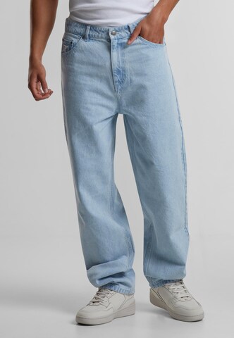 Loosefit Jean 'Flames' Karl Kani en bleu : devant