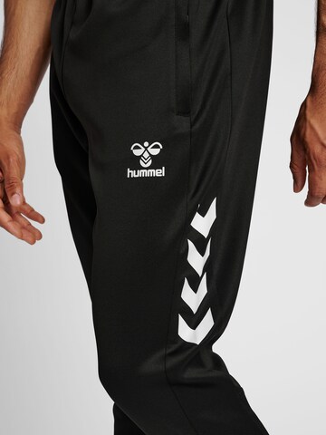 Hummel Regular Sports trousers 'CORE XK TRAINING POLY' in Black