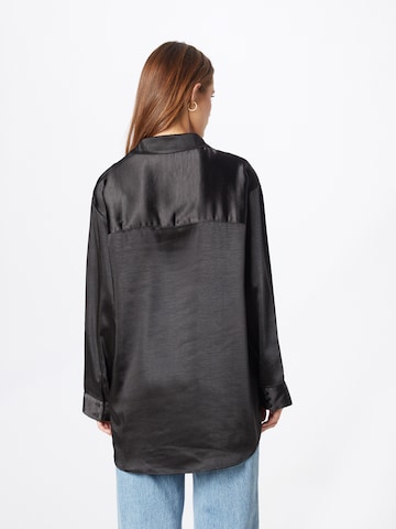 BZR - Blusa en negro