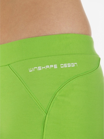 Winshape Tapered Sportbyxa 'WBE5' i grön