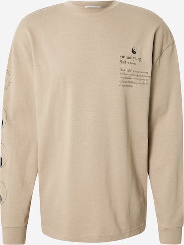 ABOUT YOU Limited T-shirt 'Levin' i beige: framsida