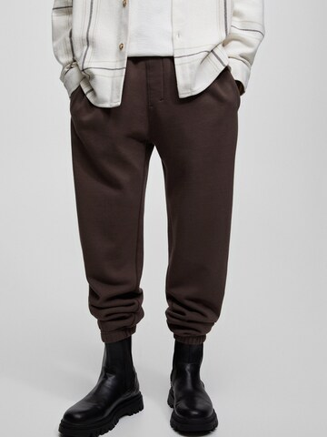 Pull&Bear Zwężany krój Spodnie w kolorze brązowy