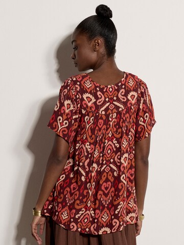 Haut ' ' Apricot en rouge