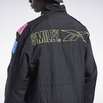 Reebok Prehodna jakna 'Smiley' | črna barva