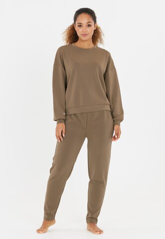Athlecia Tapered Sports trousers 'Jillnana' in Brown