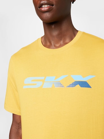 SKECHERS Performance Shirt in Yellow