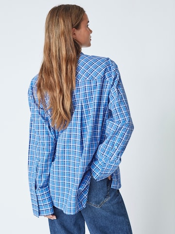 Chemisier 'Angelica' co'couture en bleu