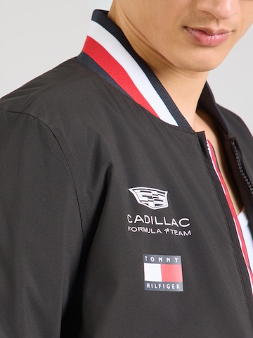 TOMMY HILFIGER Prechodná bunda 'TH x CF1 REPLICA VARSITY' - Čierna