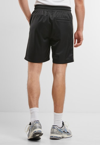 Regular Pantalon Urban Classics en noir