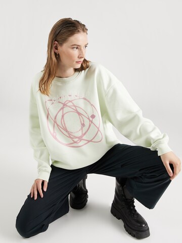 Calvin Klein Jeans Collegepaita 'GALAXY' värissä vihreä: etupuoli
