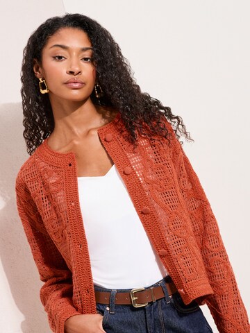 Friends Like These Neuletakki värissä oranssi