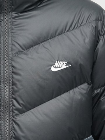 juoda Nike Sportswear Žieminė striukė 'Windrunner'