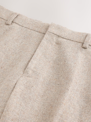 Coupe slim Pantalon à plis Next en gris