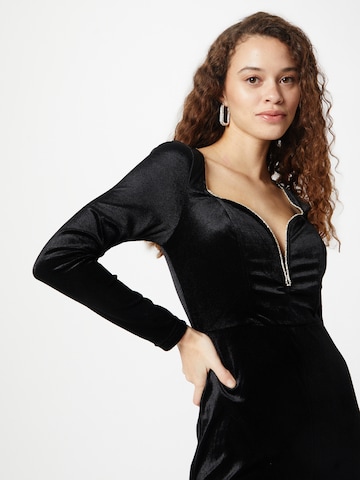 Tuta jumpsuit di Warehouse in nero