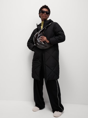 Marks & Spencer Wintermantel in Zwart