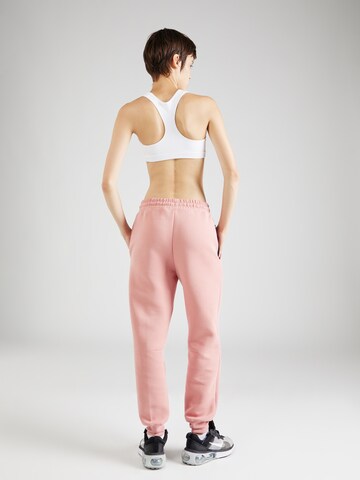 Effilé Pantalon Nike Sportswear en rose