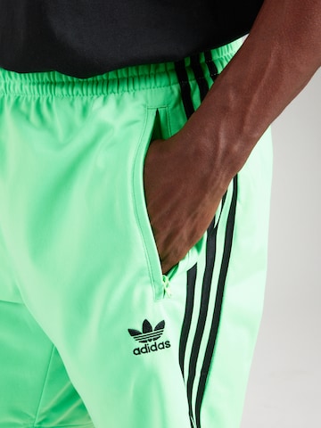ADIDAS ORIGINALS Regular Housut 'Adicolor Firebird' värissä vihreä