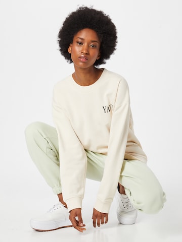 Sweat-shirt 'YAY' #NANDINI x NovaLanaLove en beige