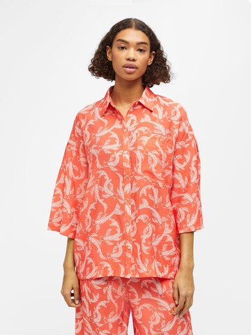 OBJECT Blus 'RIO' i orange: framsida