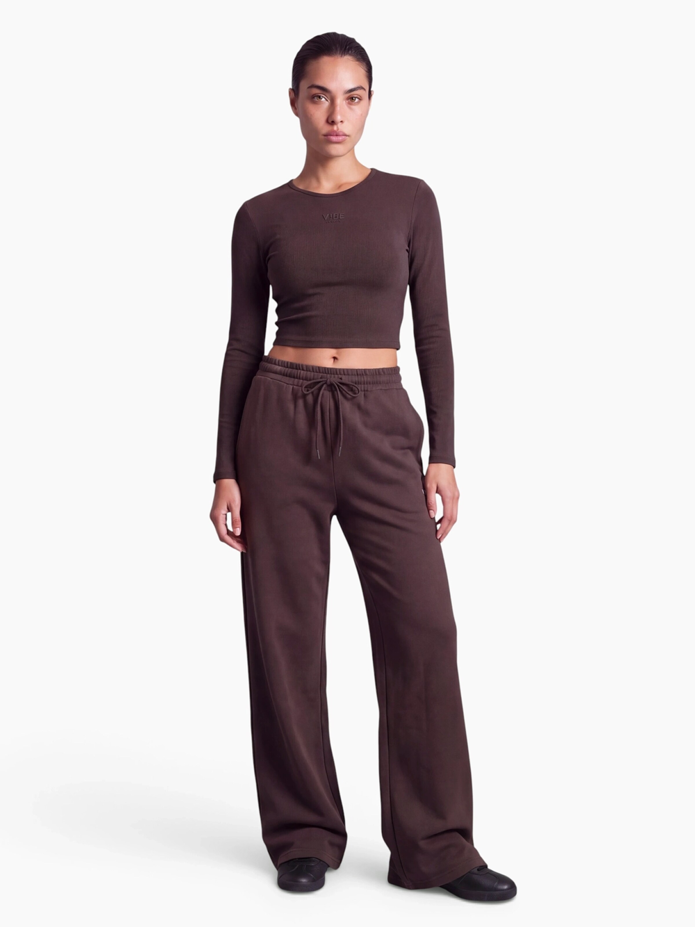 V!BE STUD!OS Wide leg Workout Pants in Brown: front