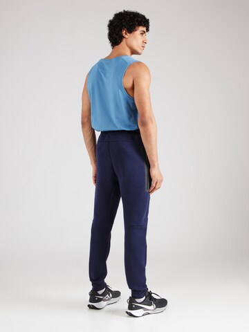 Nike Sportswear Tapered Παντελόνι 'TCH FLC' σε μπλε