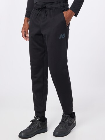 Effilé Pantalon de sport 'Tenacity' new balance en noir : devant