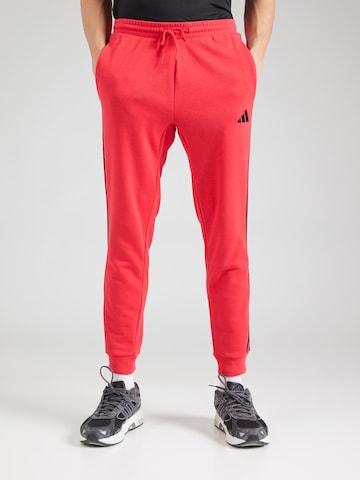 Tapered Pantaloni sportivi 'Essential' di ADIDAS SPORTSWEAR in rosso: frontale