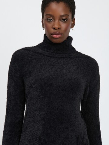 Influencer - Jersey en negro