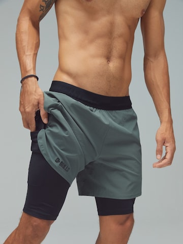 DRILLS Apparel Regular Sportbroek 'RECREATION 2-in-1 Shorts' in Groen