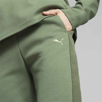 Regular Pantalon de sport 'evoStripe' PUMA en vert
