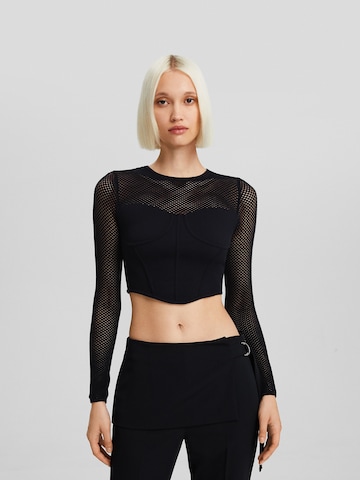 Tricou de la Bershka pe negru: față