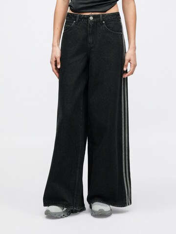 Baggy Jean 'FIREBIRD' ADIDAS ORIGINALS en noir : devant