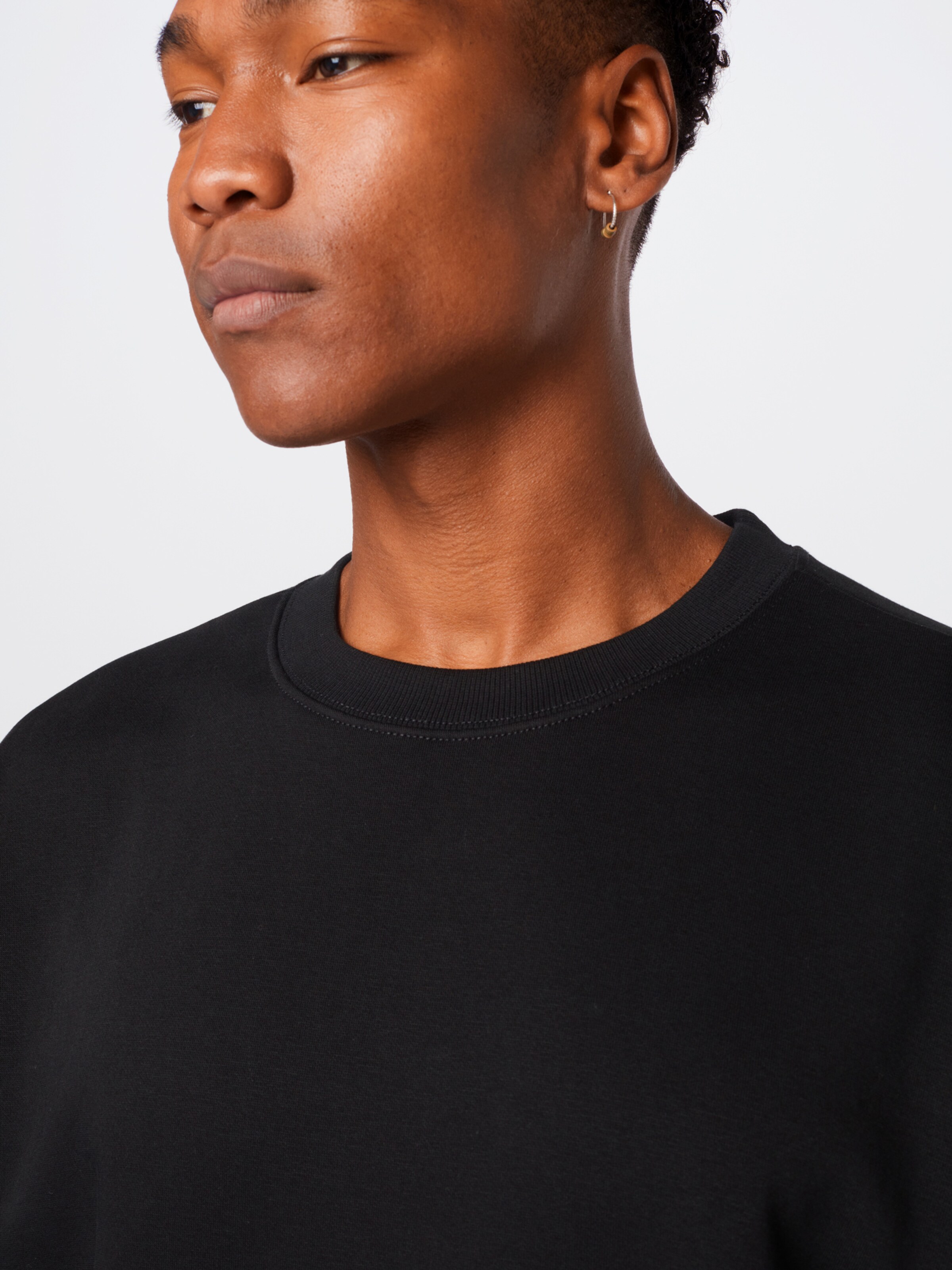 Männer Sweat WEEKDAY Sweatshirt in Schwarz - BJ62309 Männer Sweat WEEKDAY Sweatshirt in Schwarz - BJ62309