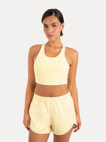 Haut de sport ' Sorea ' Smilodox en jaune : devant