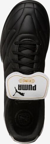 Chaussure de foot 'King Top' PUMA en noir