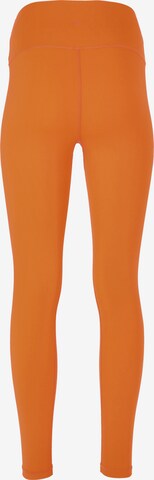 Athlecia Skinny Workout Pants 'GABY' in Orange