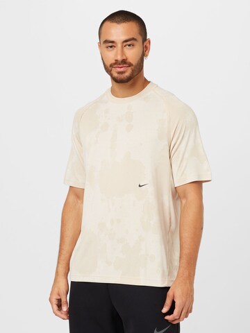 NIKE Functioneel shirt in Beige: voorkant