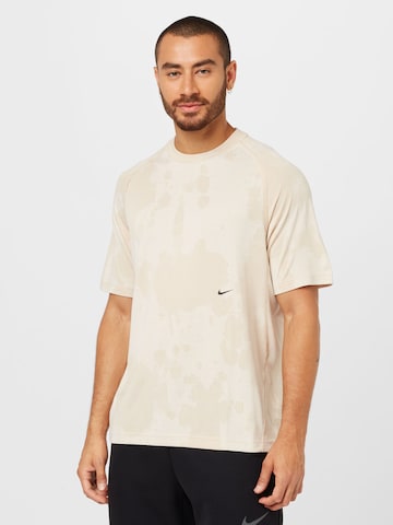 NIKE Performance Shirt 'ADV' in Beige: front