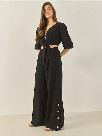 Completo pantalone di Bianco Lucci in nero