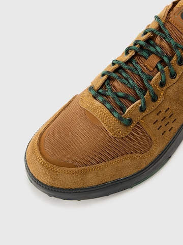 Nike Sportswear Sneakers laag 'C1TY Premium' in Bruin