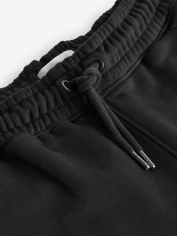 Tapered Pantaloni di Next in nero