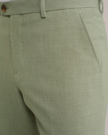 Tapered Pantaloni con piega frontale di WE Fashion in verde