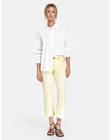 TAIFUN Boot cut Jeans in Yellow