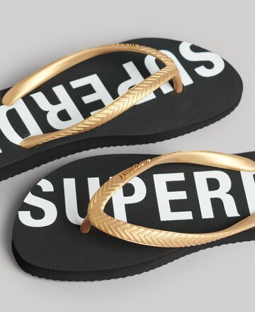Superdry T-Bar Sandals in Gold