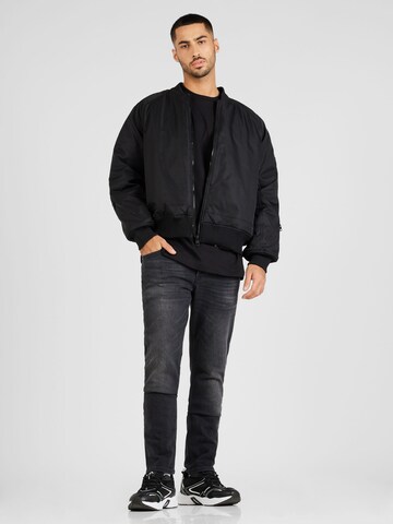 Coupe slim Jean Calvin Klein Jeans en noir