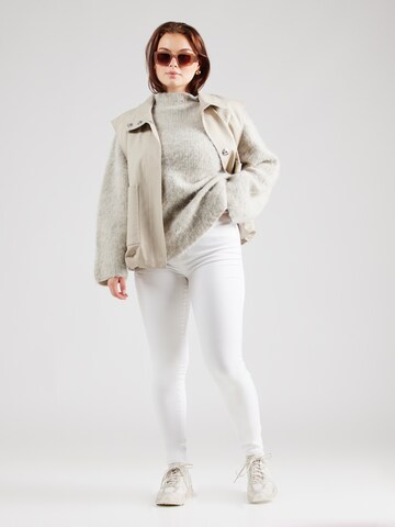 Skinny Jeans 'Augusta' di ONLY Carmakoma in bianco