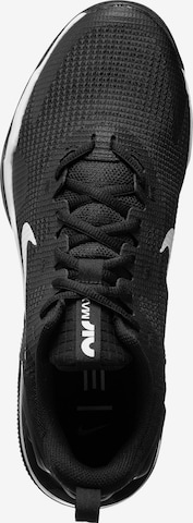 Baskets basses 'Alpha Trainer 5' NIKE en noir