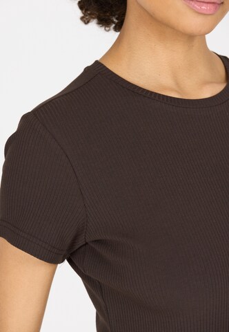 Athlecia Functioneel shirt 'Lankae' in Bruin
