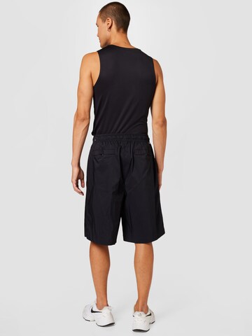 Loosefit Pantaloni di Nike Sportswear in nero